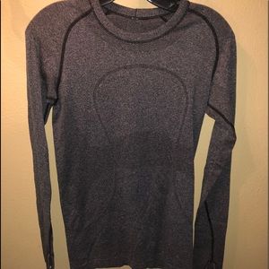 A long sleeve fitted Lululemon top.